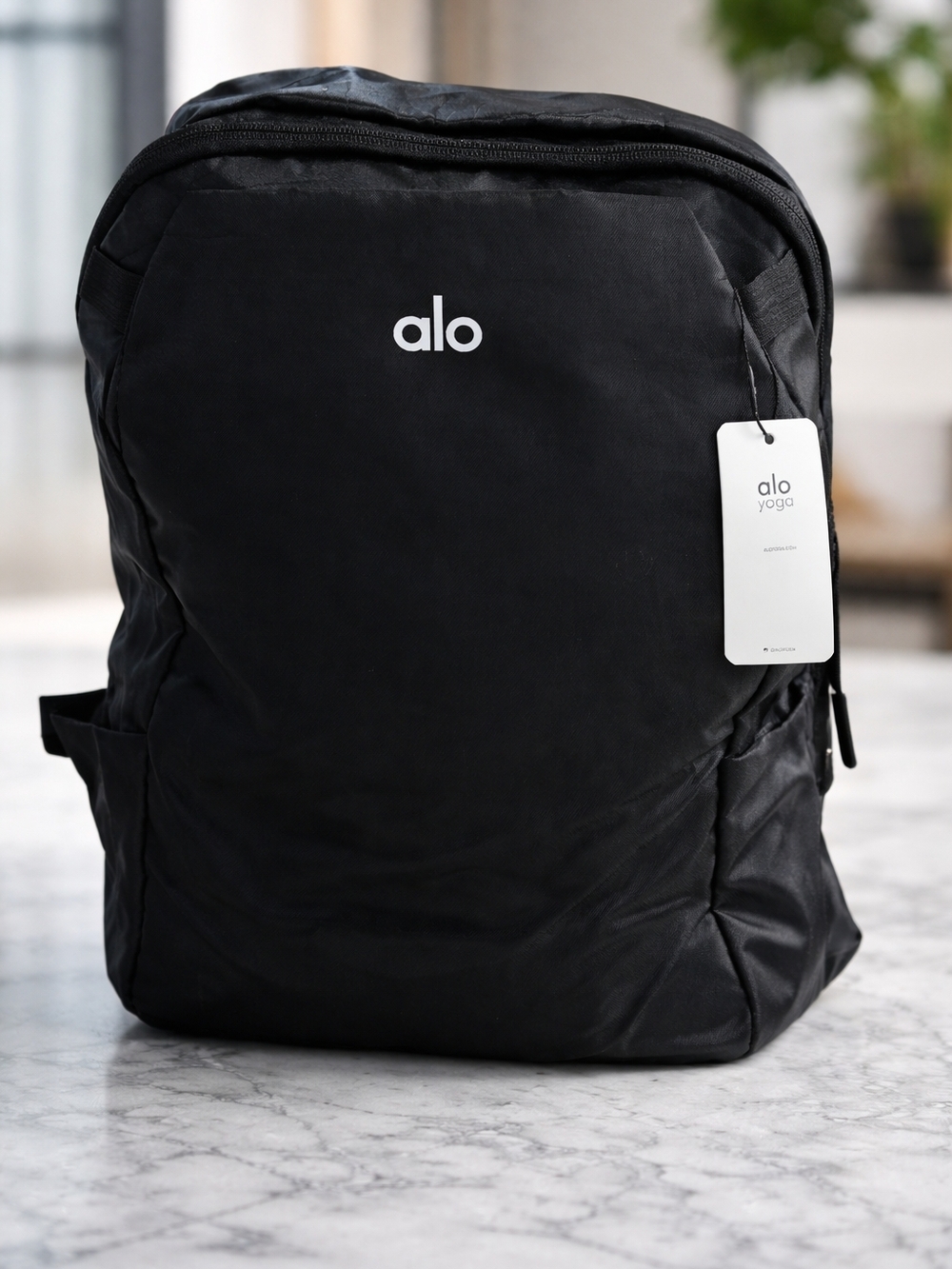ALO Yoga Black Backpack with White Logo